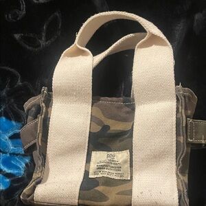 Urban Outfitters Camouflage Duffel Bag with Cream Straps